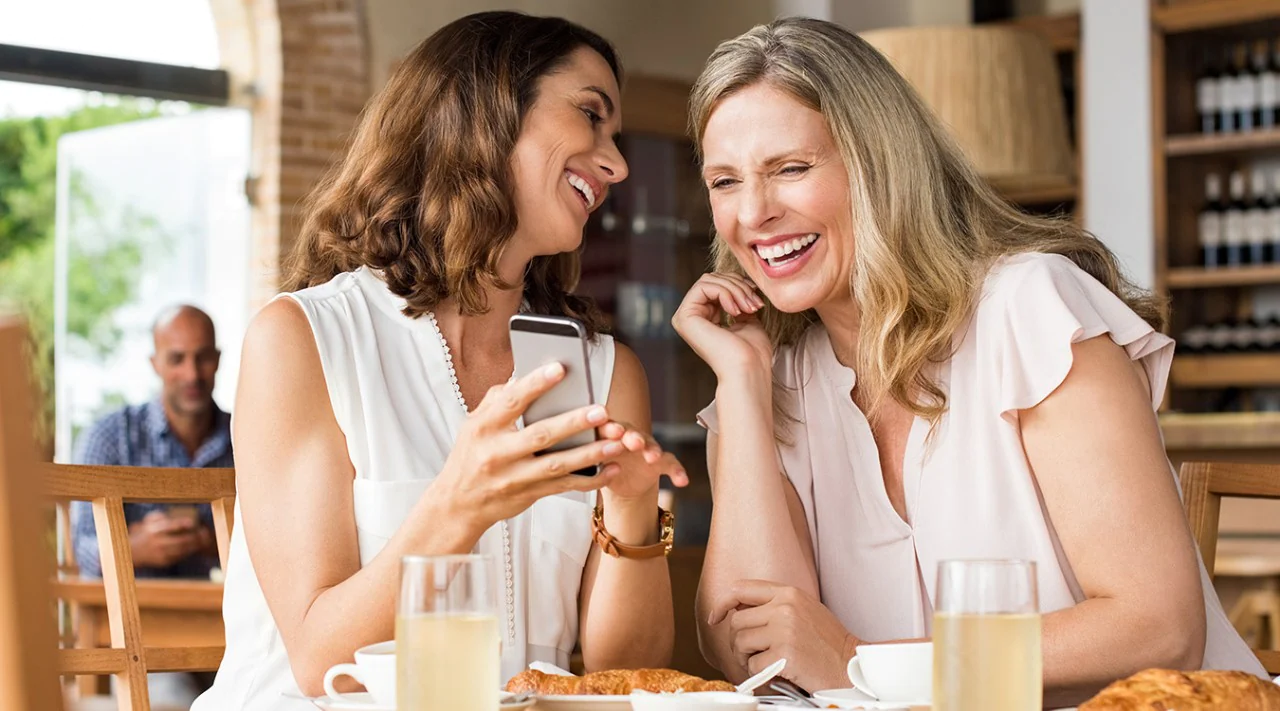 A woman reviewing her business finances on a tablet